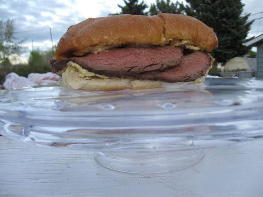Steak sandwich with roasted garlic aïoli worthy of a pedestal (With Caesar salad waiting in the wings)