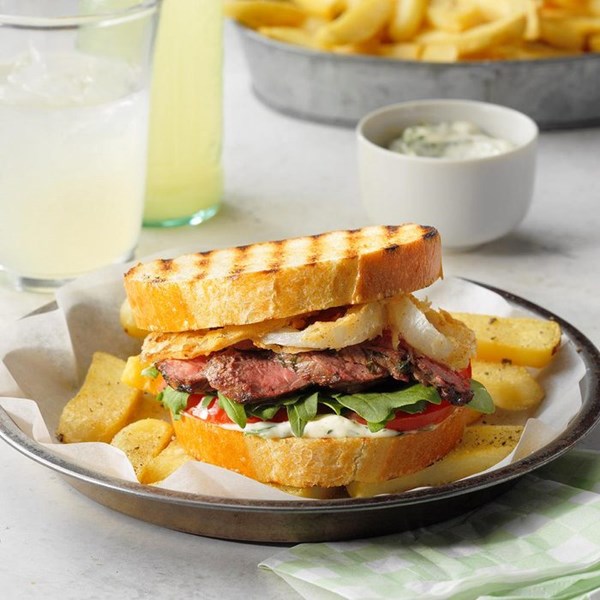 Steak sandwiches with crispy onions
