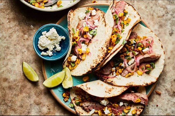 Steak tacos with caramelised corn salsa