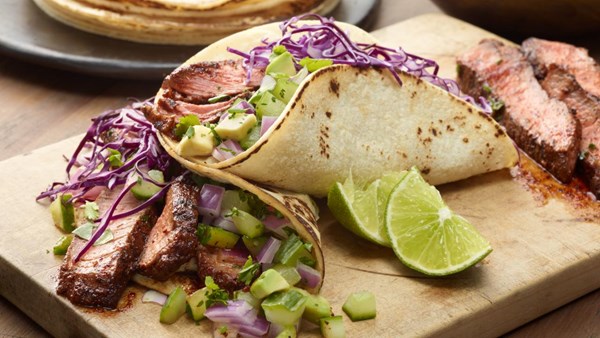 Steak tacos with cucumber-avocado salsa