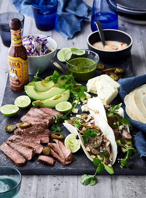 Steak tacos with Mexican green salsa
