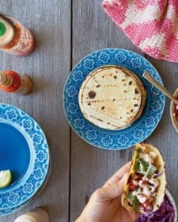 Steak tacos with pickled radishes and mashed avocados