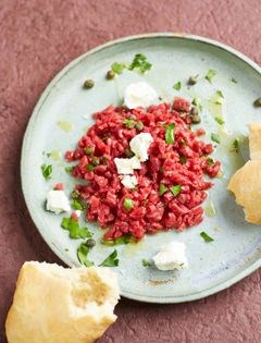 Steak tartare with pitta bread and curd cheese