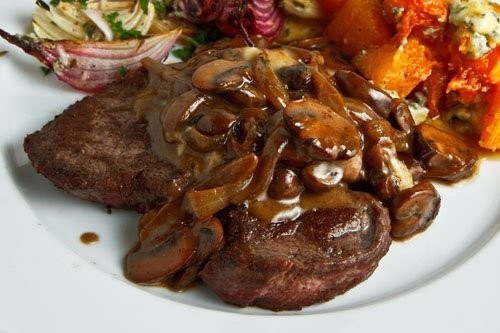 Steak tenderloin in a mushroom and blue cheese sauce