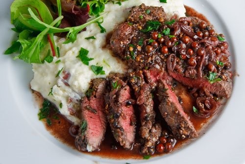 Steak tenderloin in a pink peppercorn sauce