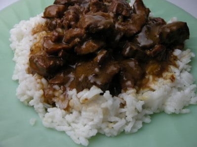 Steak tips over rice