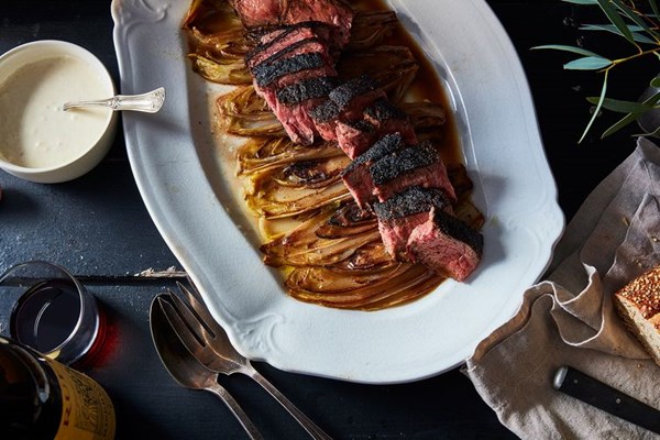 Steak with braised endive and horseradish cream
