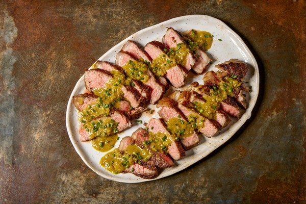 Steak with curried shallot-butter sauce