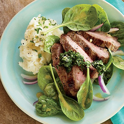 Steak with lemon-herb pesto and spinach salad