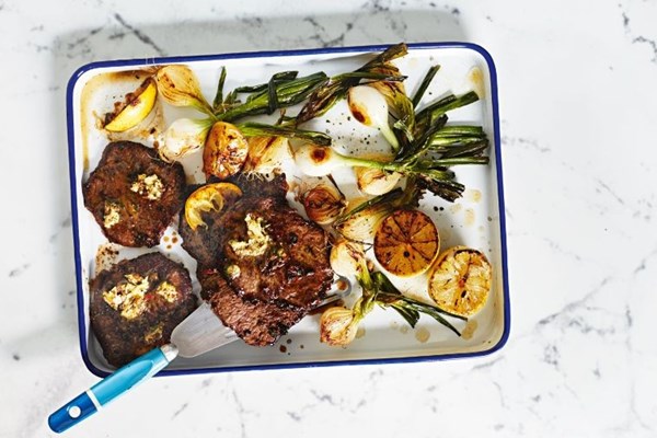 Steak with porcini butter and charred onions