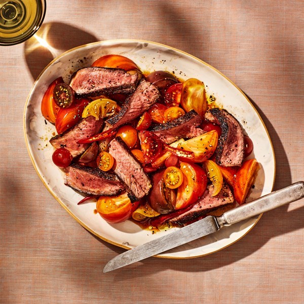 Steak with preserved-lemon-marinated tomatoes