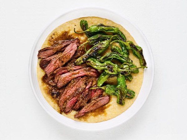 Steak with shishitos and double corn grits 