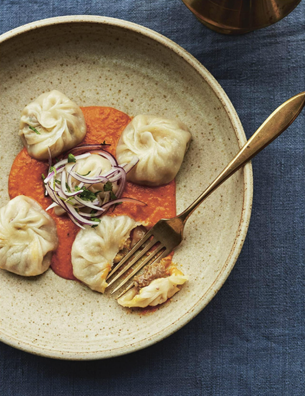 Steamed chicken momos with ginger & chilli with a tomato sesame chutney (Kukhura ko momo)
