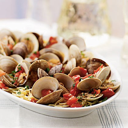 Steamed clams with tomatoes with angel hair pasta