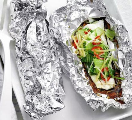 Steamed fish and pak choi parcels