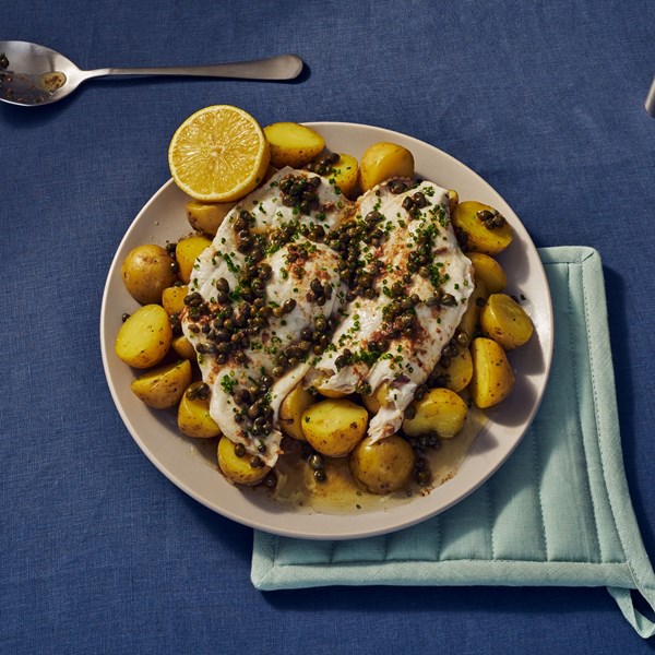 Steamed fish with potatoes and anchovy butter