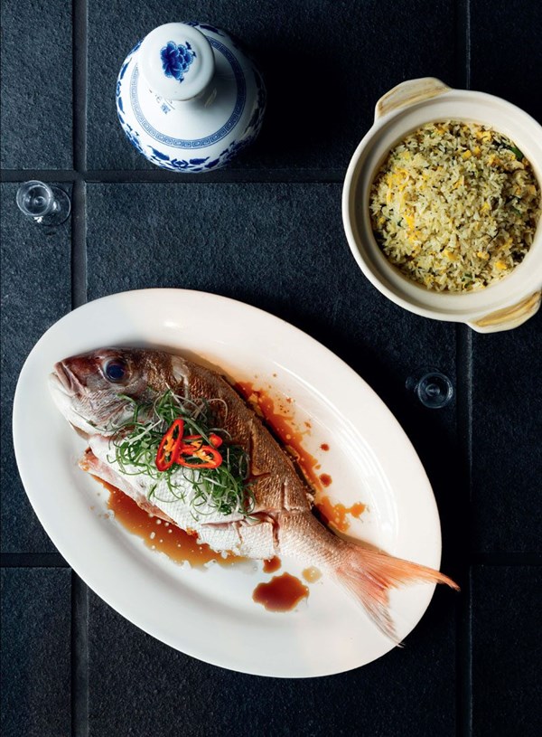 Steamed fish with soy sauce, ginger, & spring onion