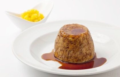 Steamed mutton and onion suet pudding with crushed swede