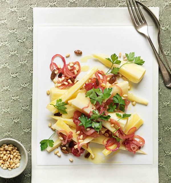 Steamed parsnips with red onion, sultanas and pine nuts