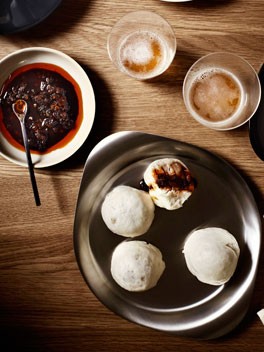 Steamed pork dumplings with Shanghai chilli vinegar