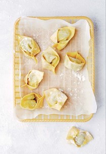 Steamed prawn dumplings with Szechuan chilli sauce 