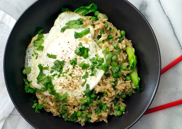 Steamed rice and spring vegetables with fried eggs