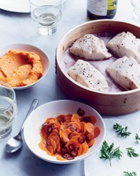 Steamed sea bass with carrots three ways