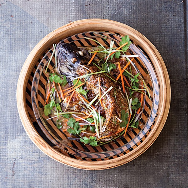 Steamed sea bass with garlic brown bean sauce (Nian nian nyu wee)