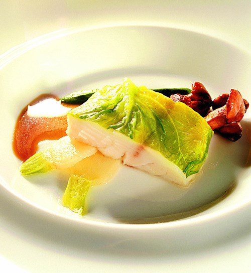 Steamed striped bass with chanterelles & lettuce cream