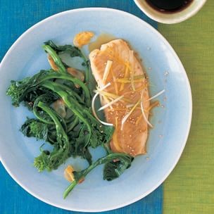 Steamed tilapia with sesame seeds, ginger and green onion