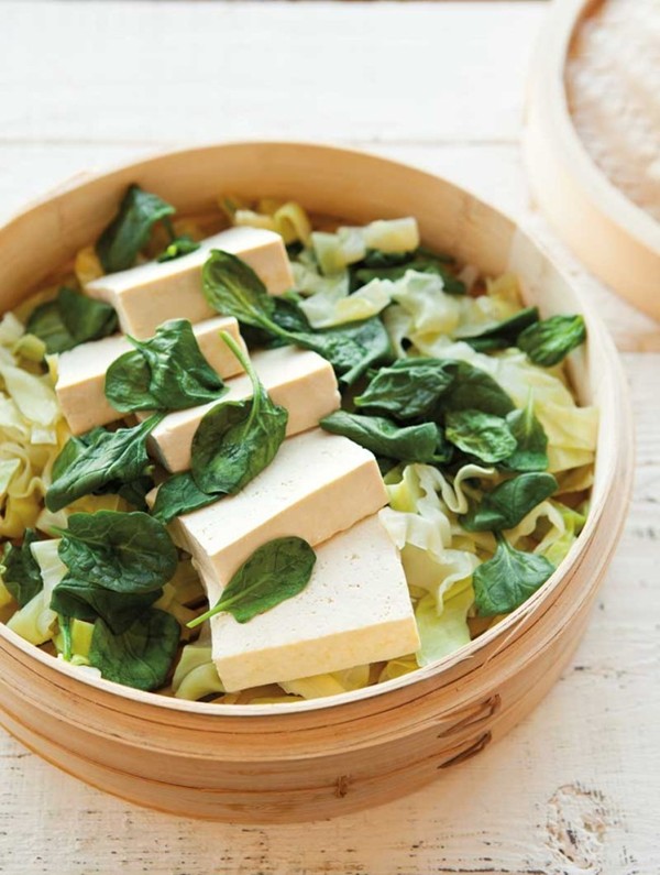 Steamed tofu with greens & peanut sauce