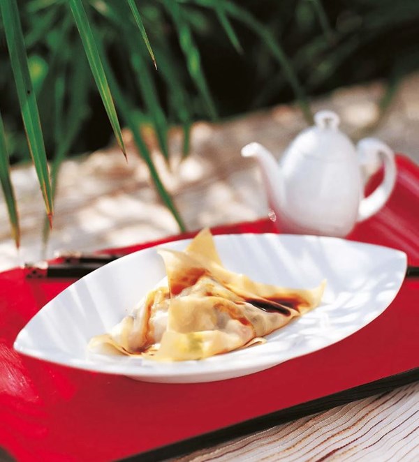 Steamed tomato and olive dumplings