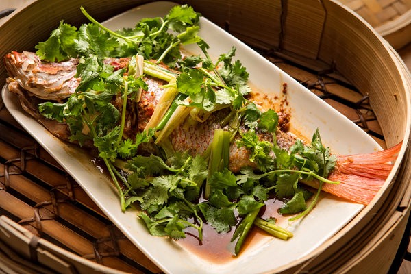 Steamed whole fish with ginger and sesame
