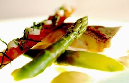 Steamed wild sea bass, razor clams, asparagus, pastis and saffron sauce