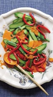 Steamed zucchini and roasted peppers with tomato-garlic dressing