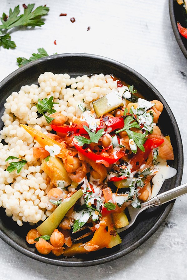 Stewed chickpeas with peppers, zucchini, and Israeli couscous