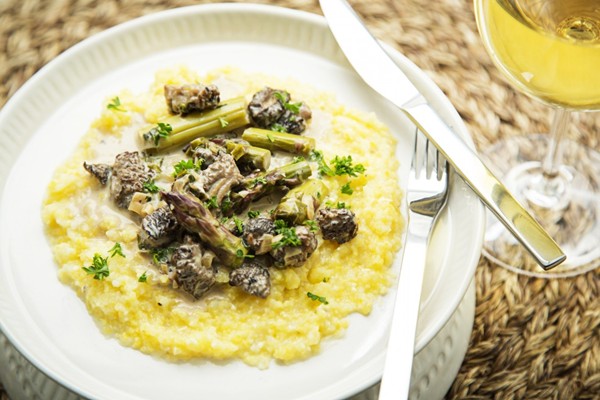 Stewed morels, asparagus, ramps, and crème fraîche over grits