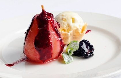 Stewed pear with winter berry coulis, fennel and ginger ice cream