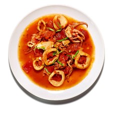 Stewed squid with tomatoes, garlic and anchovies