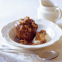 Sticky banana puddings with tipsy toffee and walnut sauce