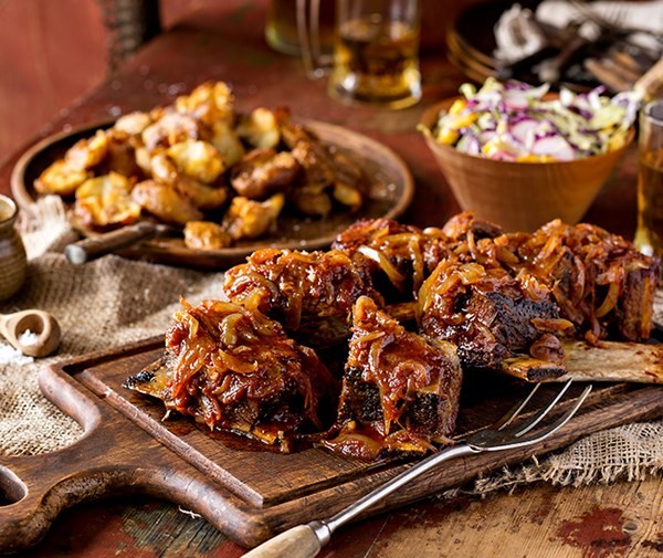 Sticky beef short ribs, smashed spuds & harvest slaw