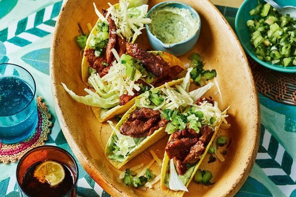 Sticky beef tacos with creamy avocado dressing