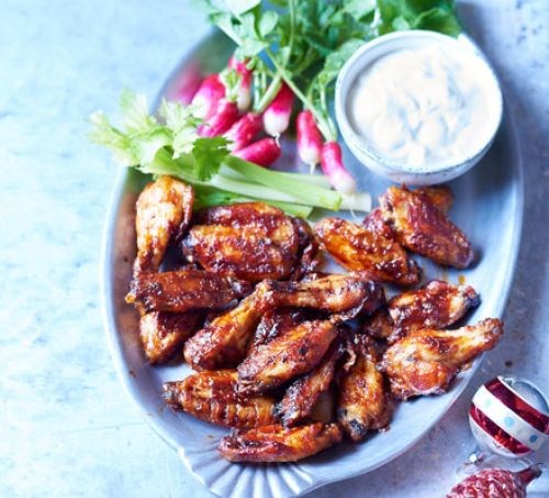 Sticky bourbon BBQ wings with blue cheese dip