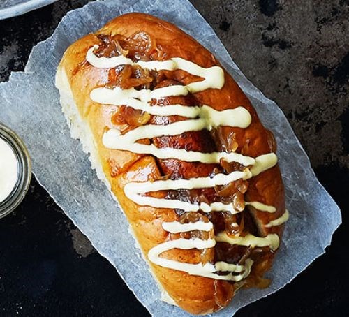 Sticky cider onion hot dogs