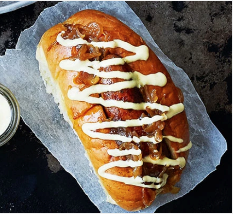 Sticky cider onion hot dogs