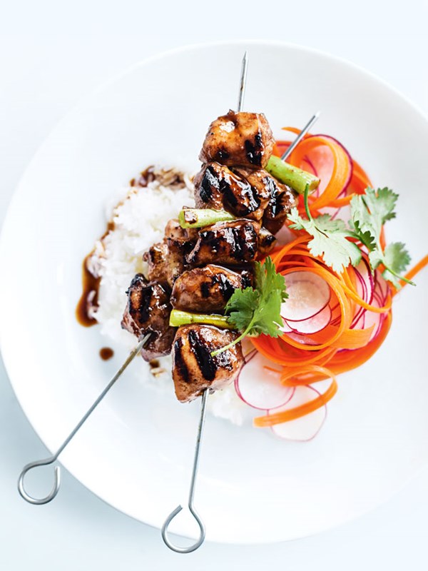 Sticky five-spice chicken skewers with radish and carrot salad