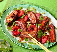 Sticky five-spice pork belly with ginger & plums