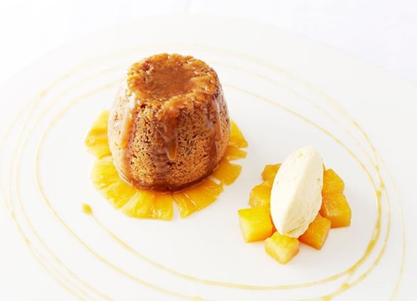 Sticky ginger pudding, marinated pineapple, mango cream and ginger beer syrup