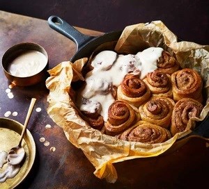 Sticky gingerbread buns with spiced brown butter icing