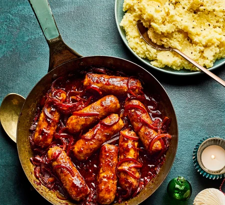Sticky harissa sausages with parsnip mash